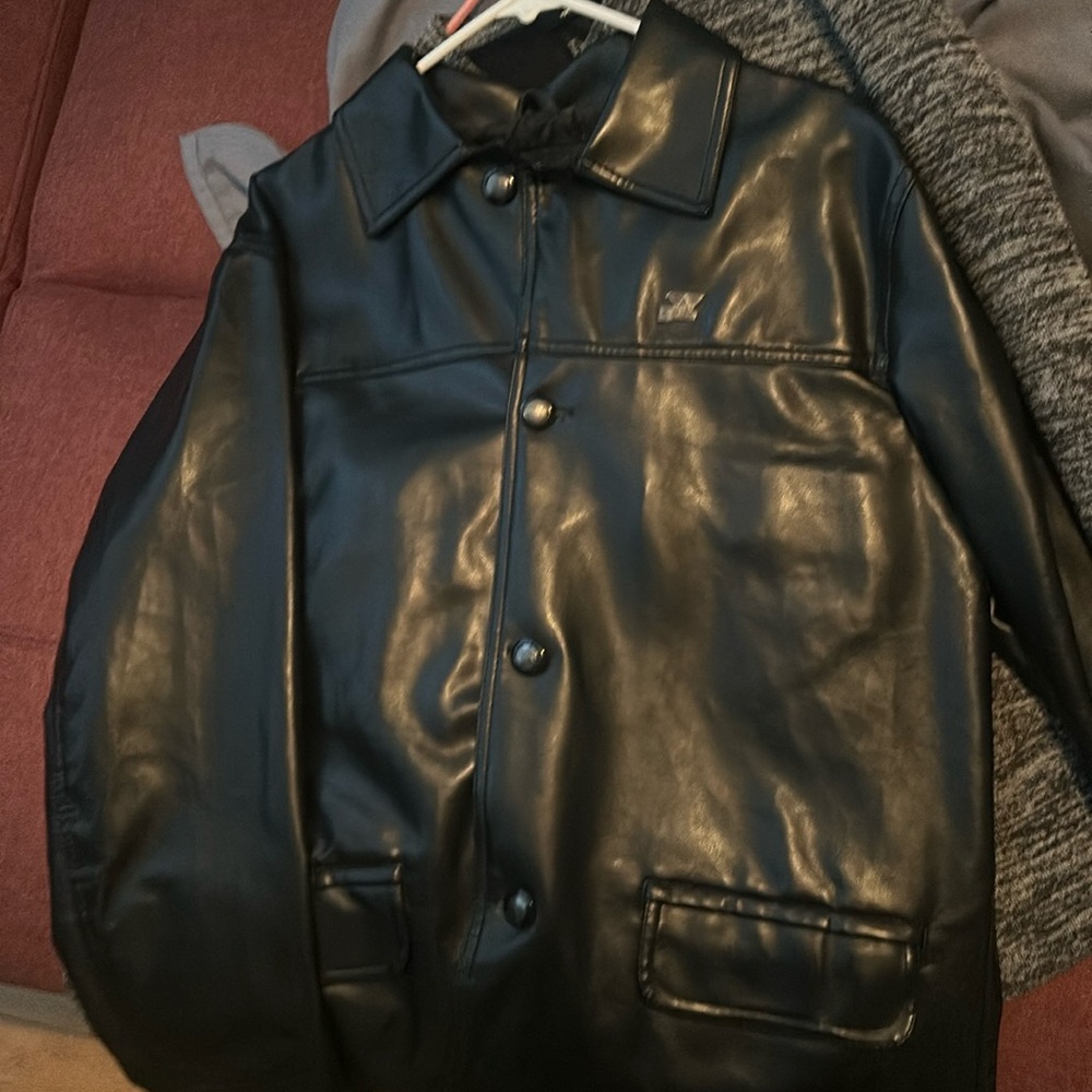 Black Armani leather jacket, button up.